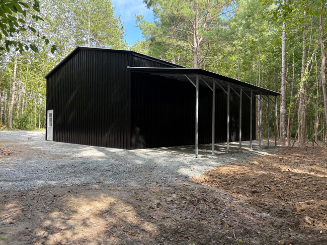 30' wide, 45' long, 14' tall metal garage with vertical metal roof and vertical metal siding and a 12' x 25' x 10' lean to
